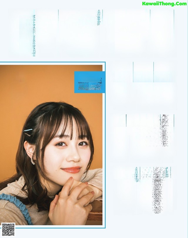 A magazine page with a picture of a woman with long hair.