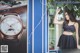 A woman standing in front of a poster of a watch.